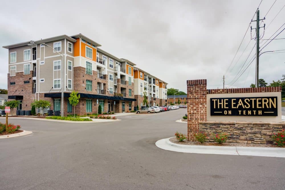 the eastern on 10th off campus apartments near east carolina university ecu community entrance monument sign parking lot